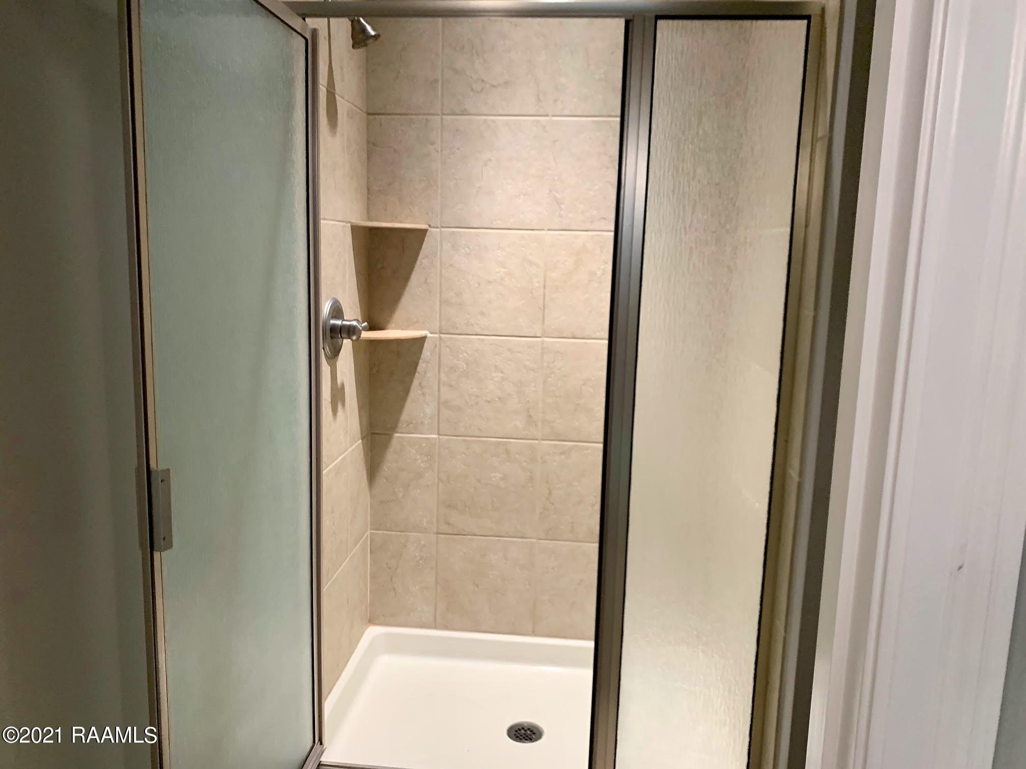 1231 Delcambre Road Breaux Bridge, LA 70517 - Photo 32 of 48 Tiled Master Shower