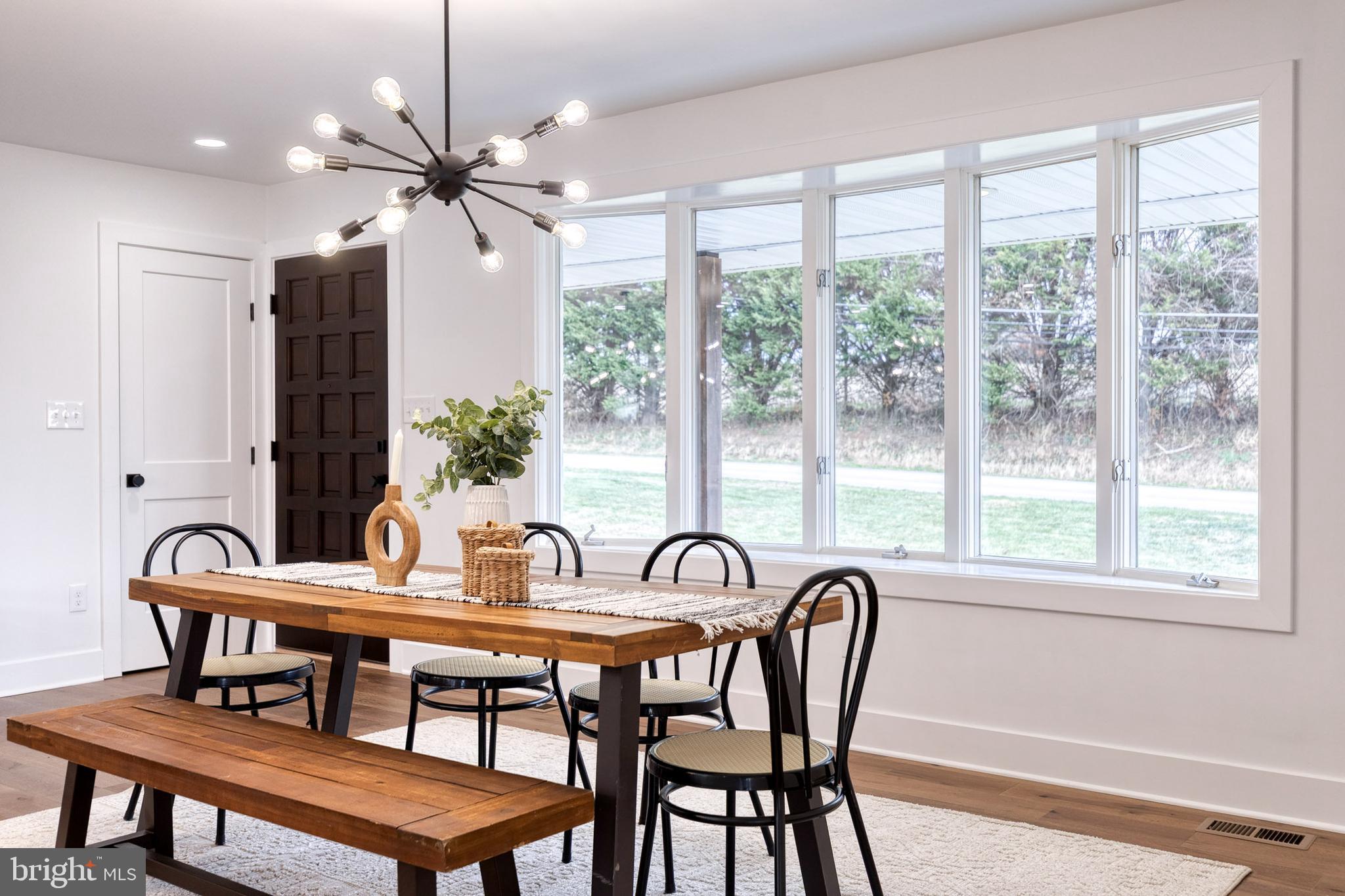 4011 Perry Hall Road Perry Hall, MD 21128 - Photo 14 of 51 a view of a dining room with furniture window and outside view