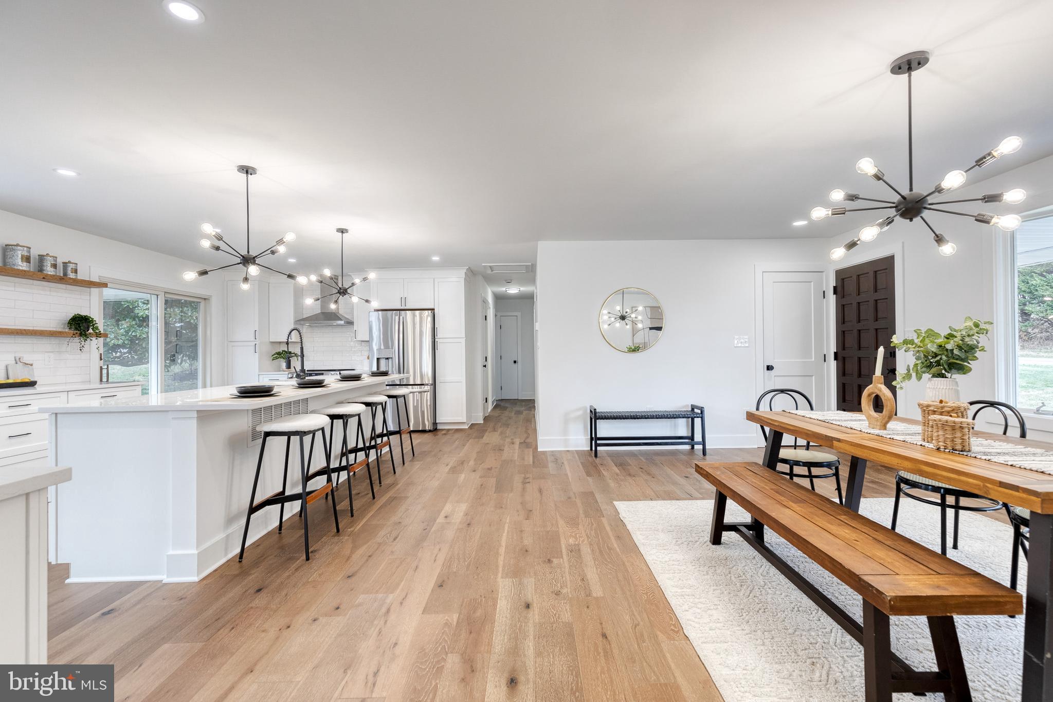 4011 Perry Hall Road Perry Hall, MD 21128 - Photo 18 of 51 a view of a kitchen with dining table and chairs