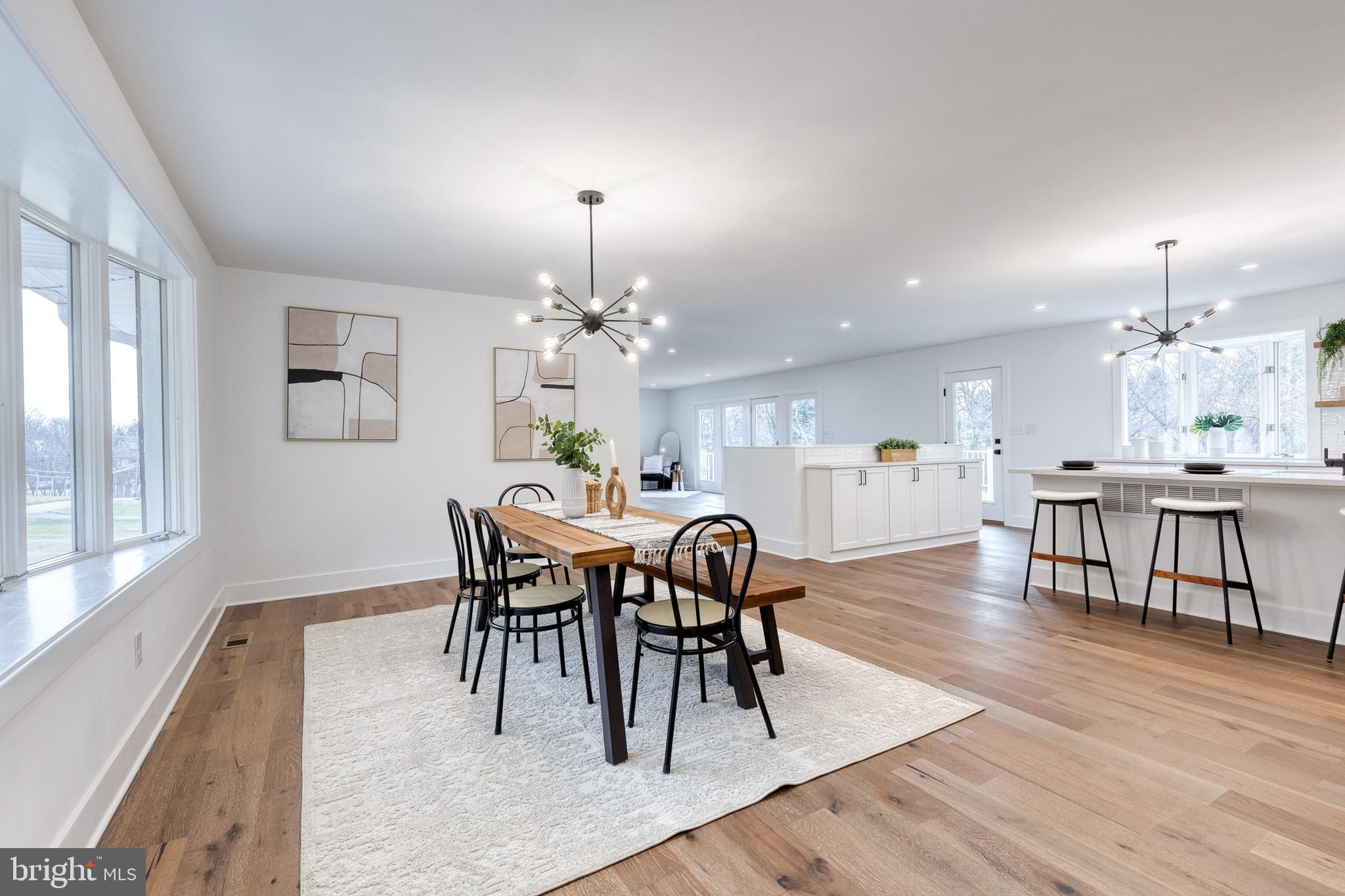 4011 Perry Hall Road Perry Hall, MD 21128 - Photo 20 of 51 a view of a dining room with furniture and wooden floor