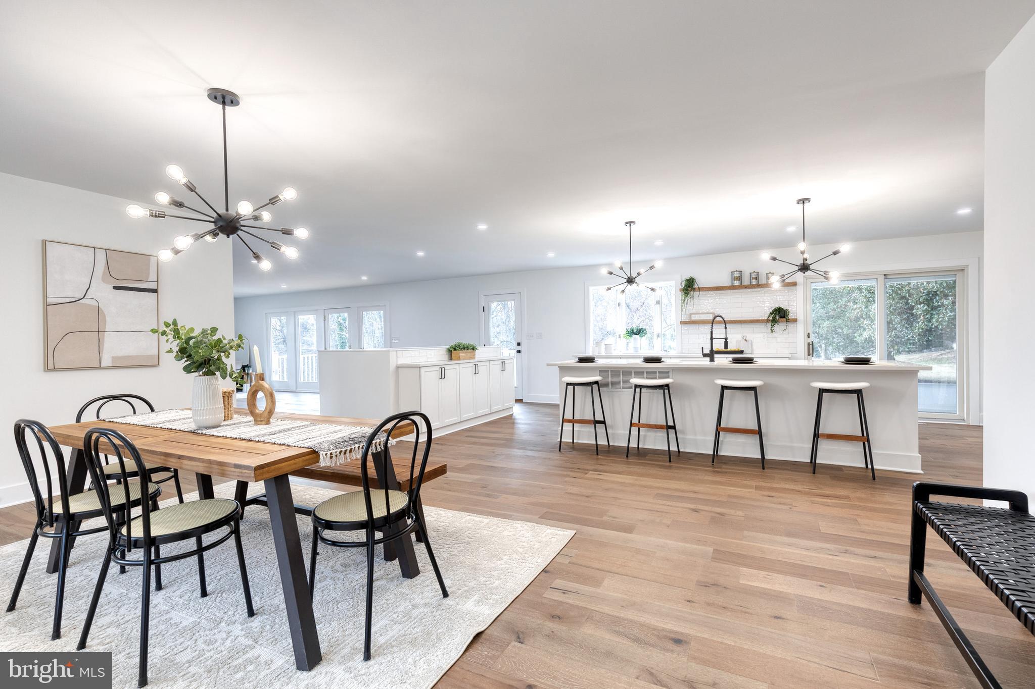4011 Perry Hall Road Perry Hall, MD 21128 - Photo 21 of 51 a view of a dining room with furniture and wooden floor