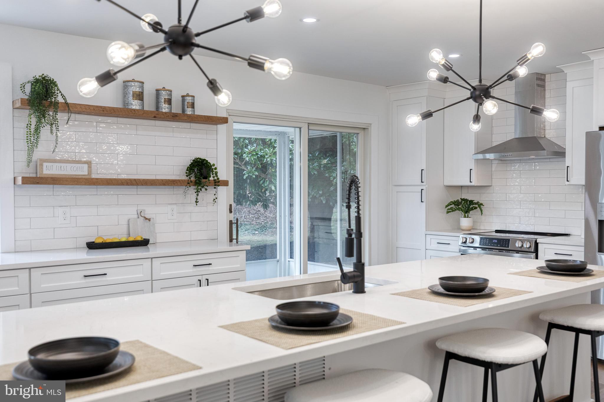 4011 Perry Hall Road Perry Hall, MD 21128 - Photo 24 of 51 a kitchen with a sink a counter and cabinets