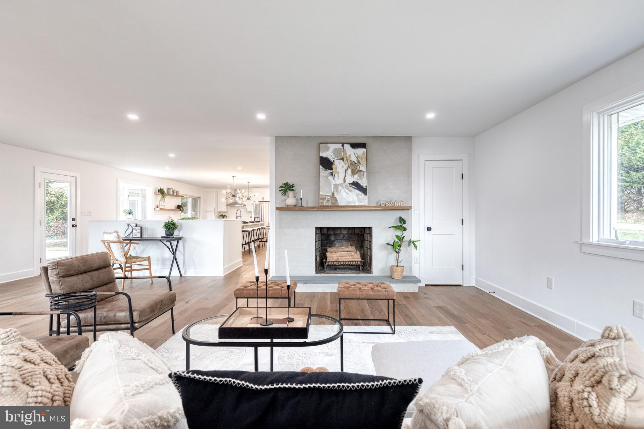 4011 Perry Hall Road Perry Hall, MD 21128 - Photo 3 of 51 a living room with furniture and a fireplace