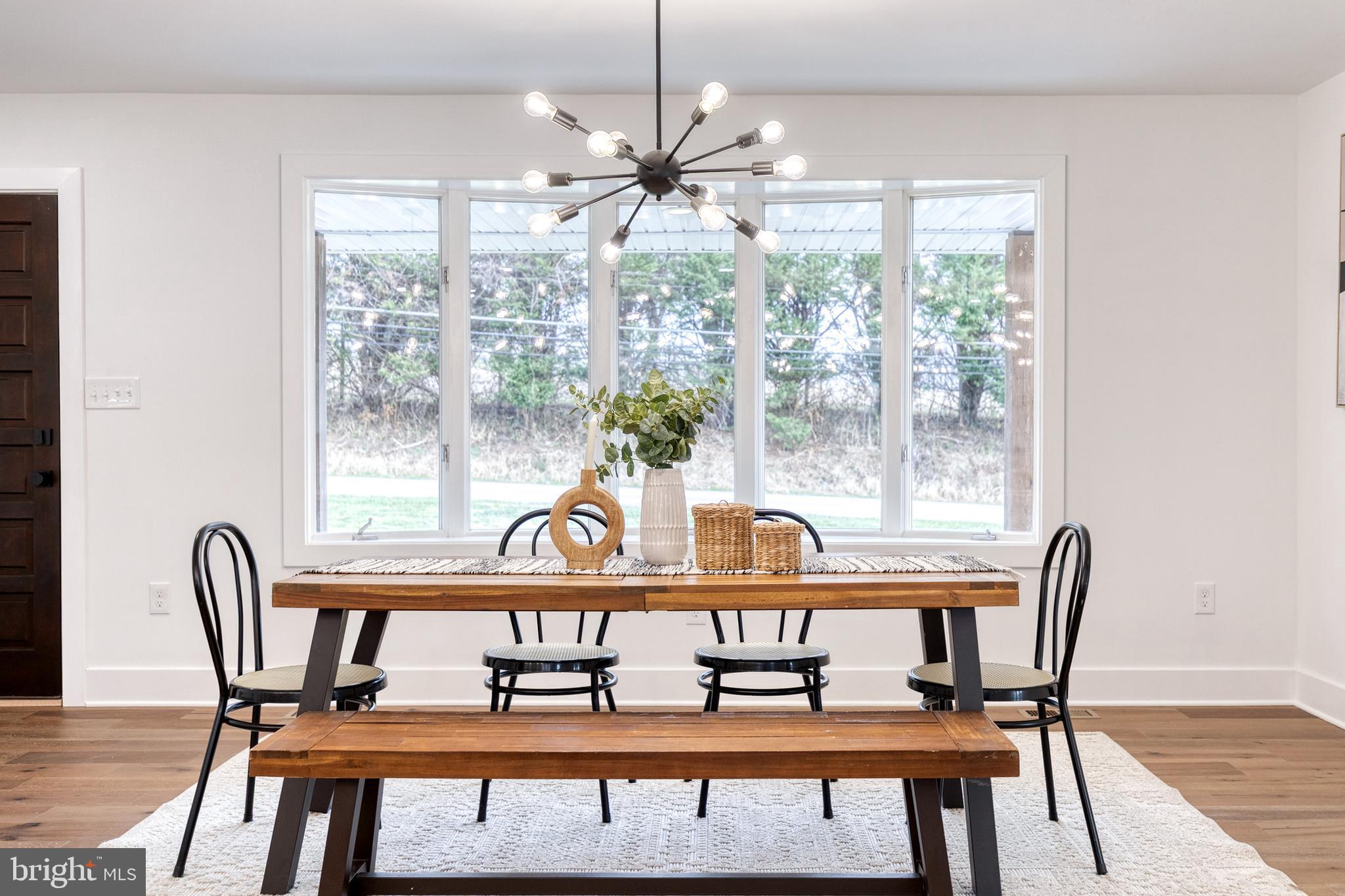 4011 Perry Hall Road Perry Hall, MD 21128 - Photo 4 of 51 a view of a dining room with furniture window and wooden floor