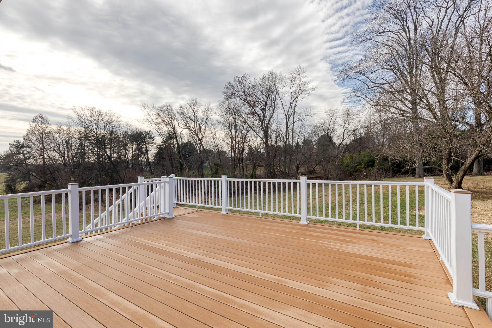 4011 Perry Hall Road Perry Hall, MD 21128 - Photo 46 of 51 a balcony with wooden floor and fence