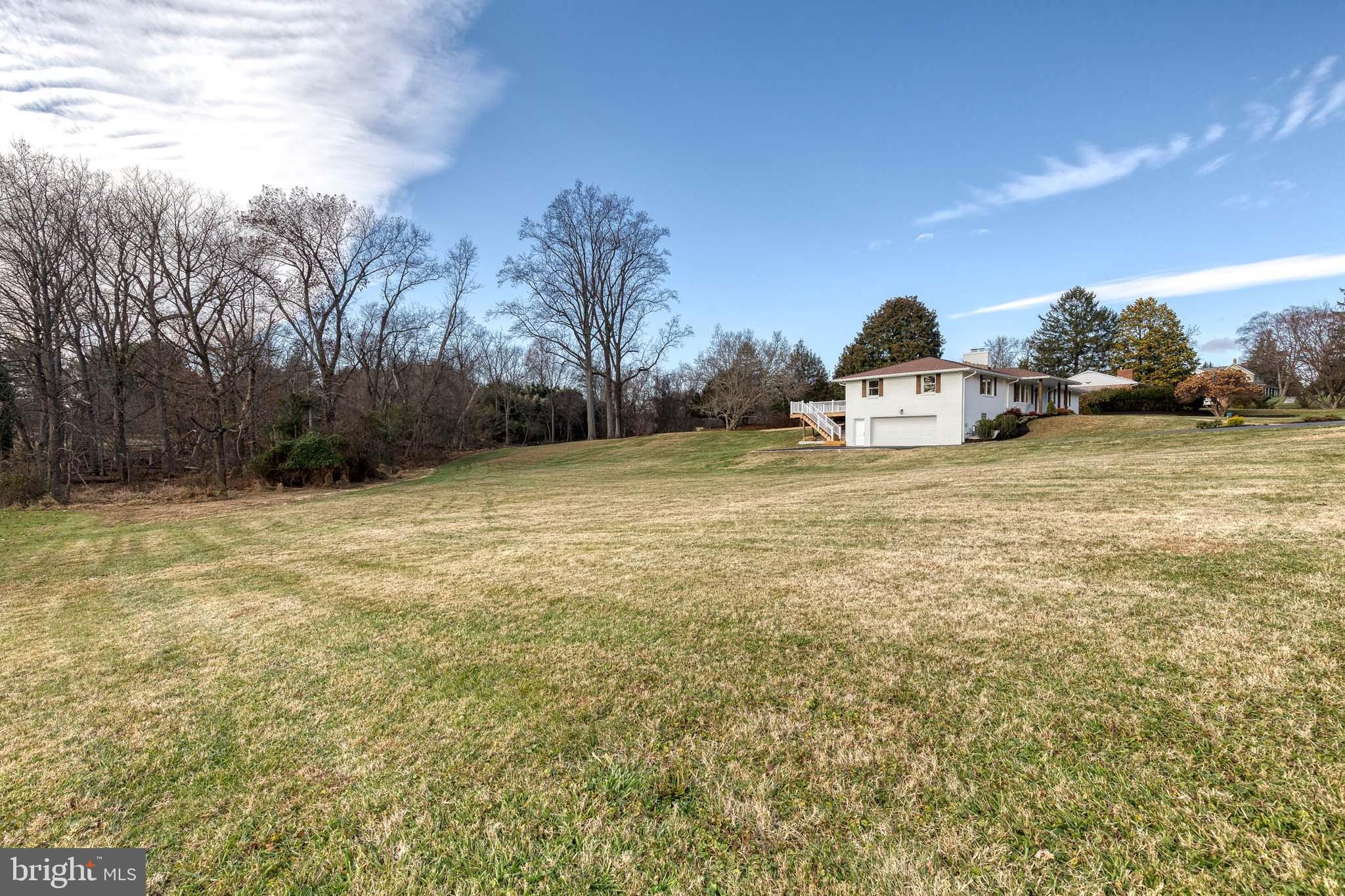 4011 Perry Hall Road Perry Hall, MD 21128 - Photo 49 of 51 a view of a yard with a house in the background