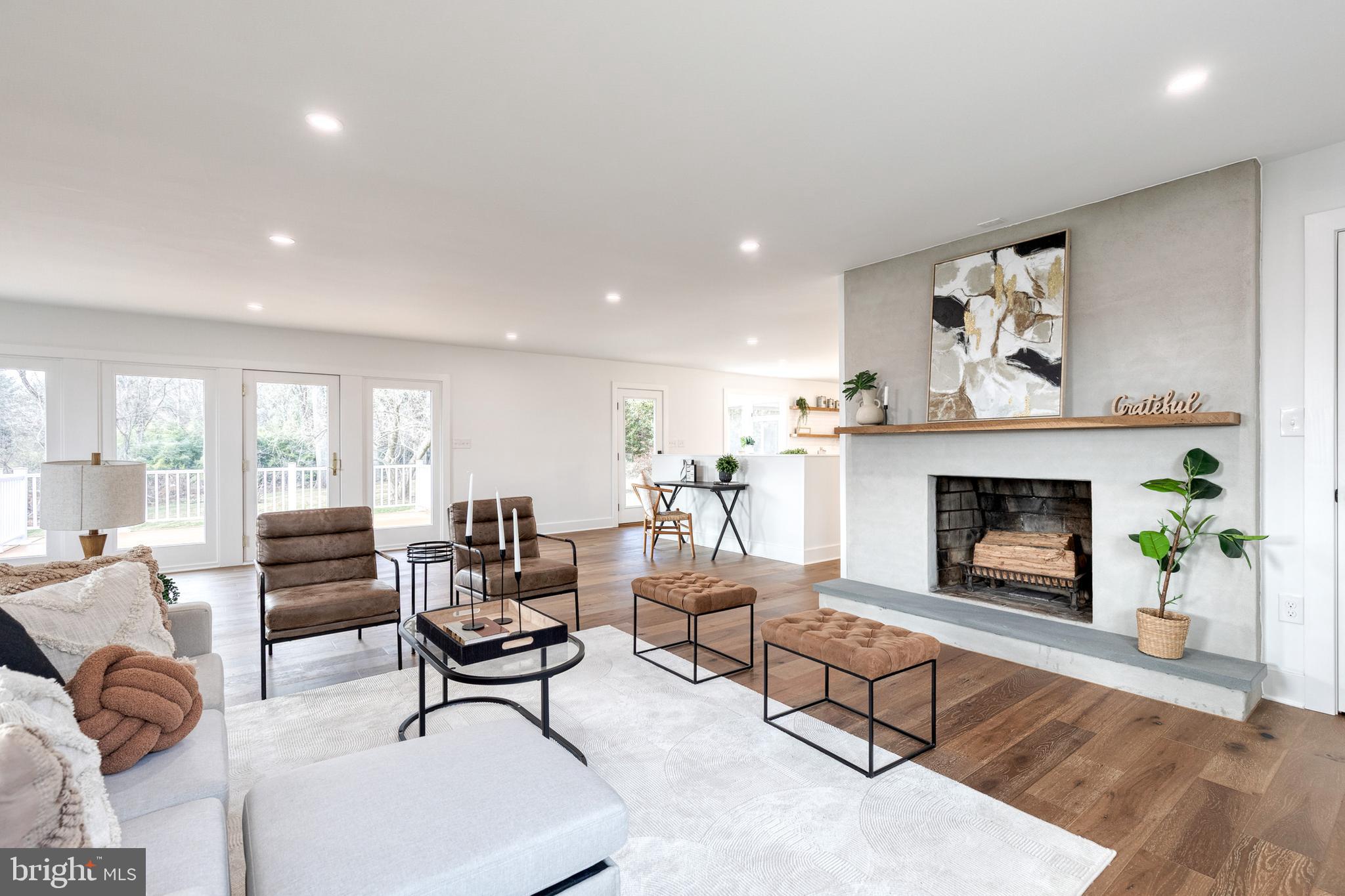 4011 Perry Hall Road Perry Hall, MD 21128 - Photo 9 of 51 a living room with furniture and a fireplace