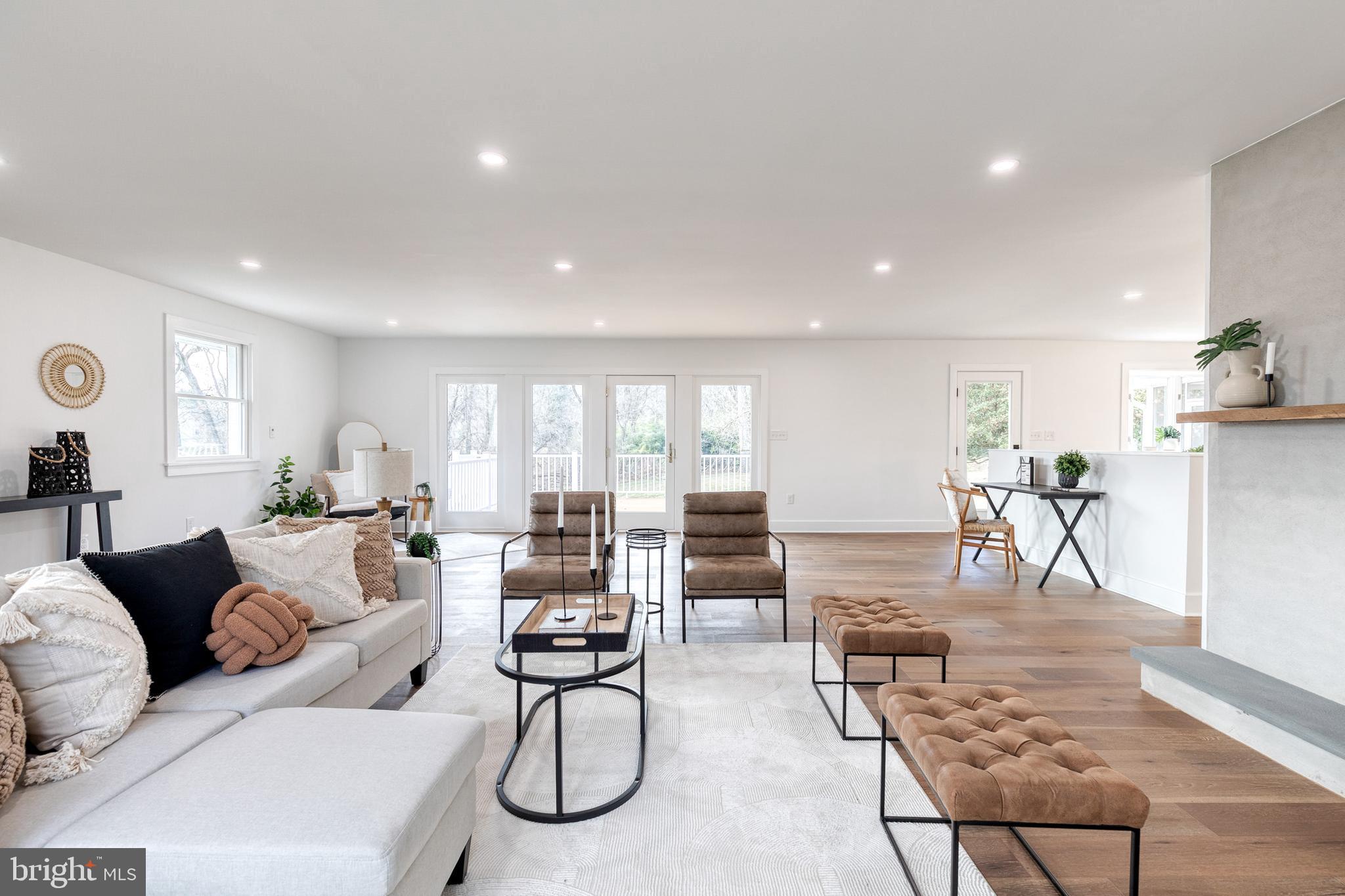 4011 Perry Hall Road Perry Hall, MD 21128 - Photo 10 of 51 a living room with furniture and a table