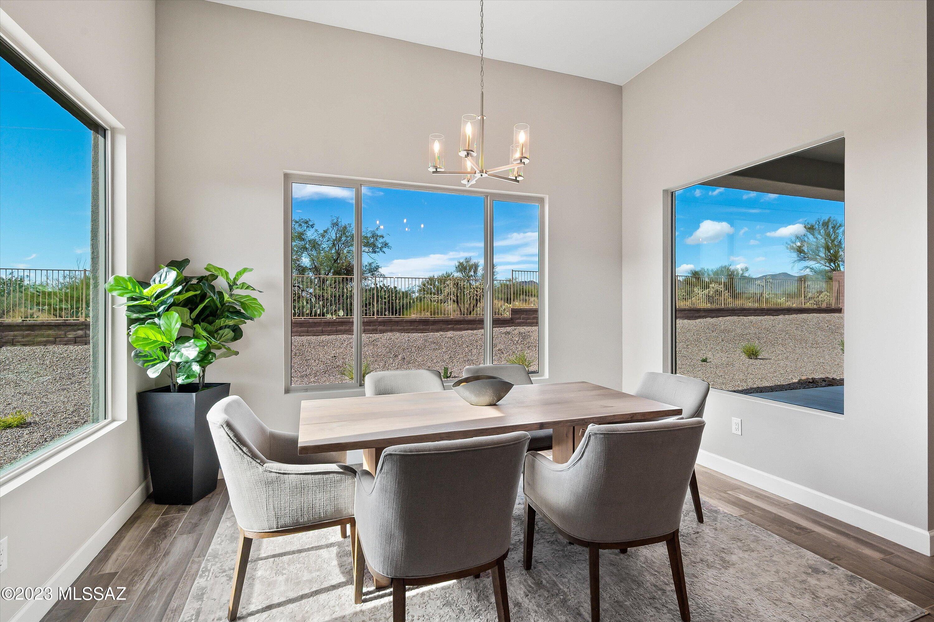 13169 North Vistoso Rnch Place Oro Valley, AZ 85755 - Photo 10 of 29 a view of a dining room with furniture window and outside view