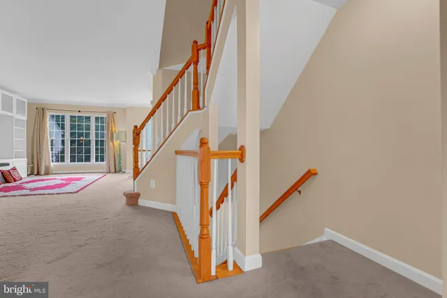 a kitchen with stainless steel appliances granite countertop a refrigerator sink and cabinets