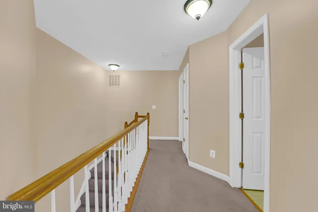 a view of an outdoor space and tennis court