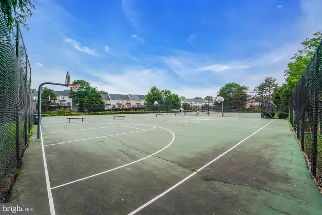 a view of car parked on the side of a road