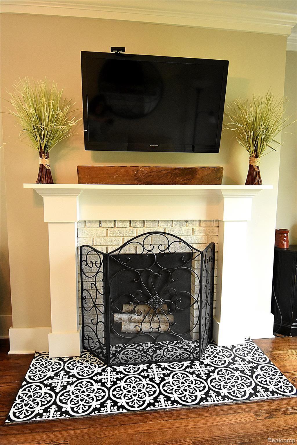9670 Marshall Road South Lyon, MI 48178 - Photo 17 of 40 14 BEDROOM 2 FIREPLACE.JPG