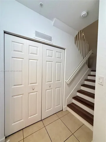 a view of an entryway with stairs