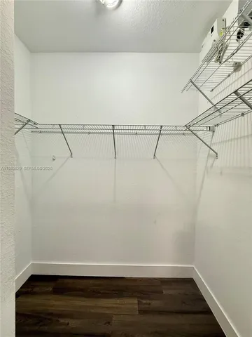 a view of small space with racks on the wall