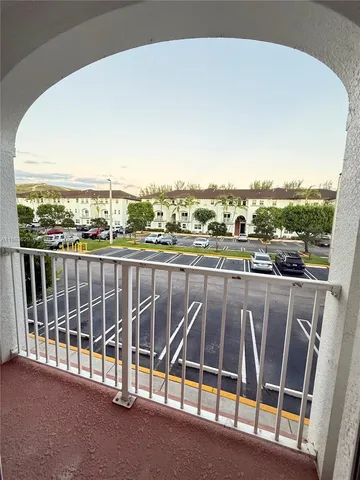 a view of a house with sitting space and garden