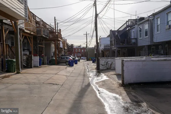 a view of street with sitting area