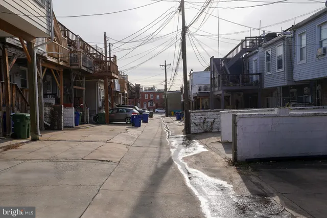 a view of street with sitting area