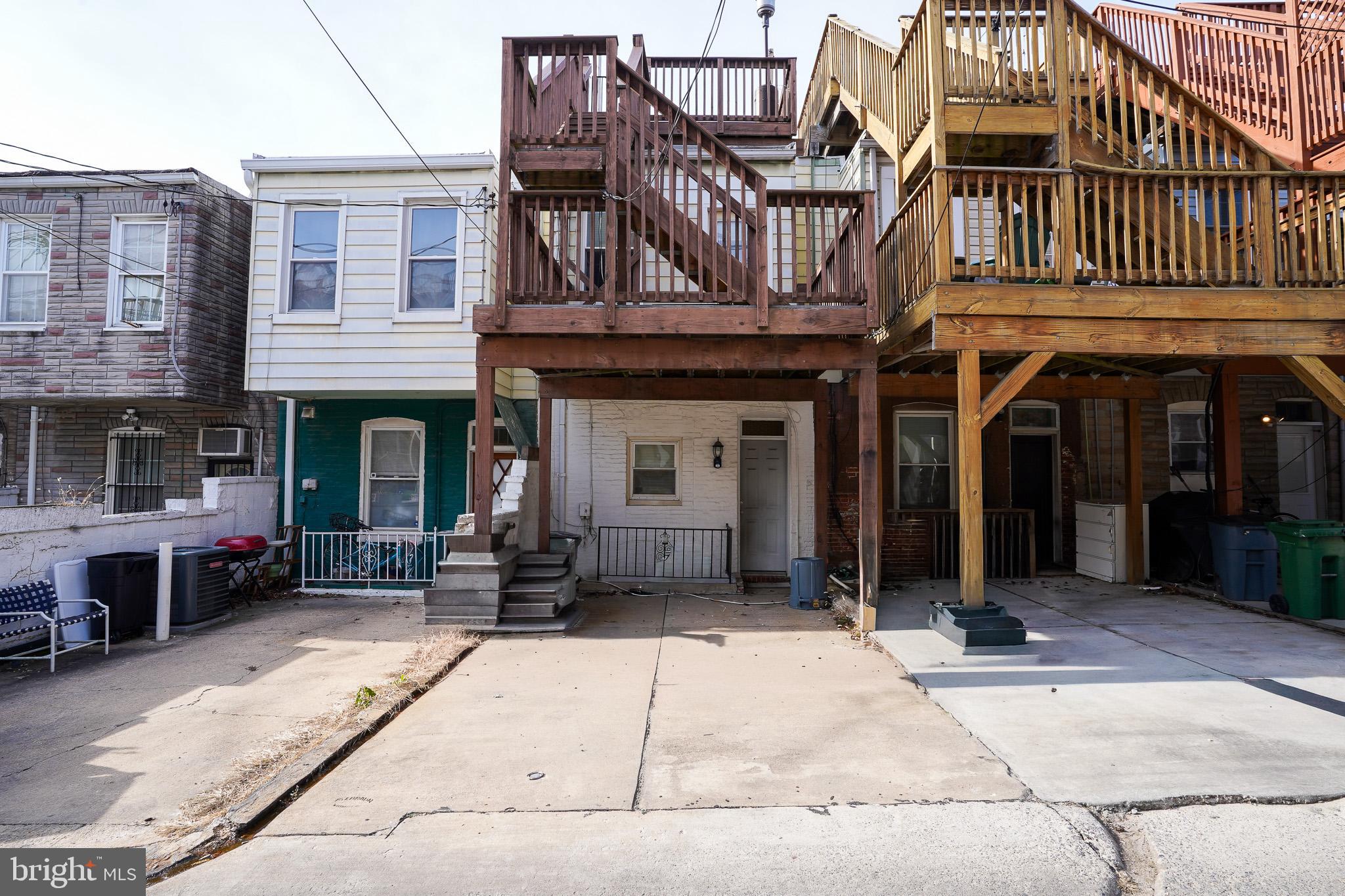 713 South Linwood Avenue Baltimore, MD 21224 - Photo 28 of 32 a view of a building with brick walls