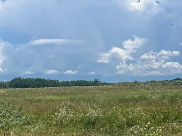 a view of a lake in middle of the town
