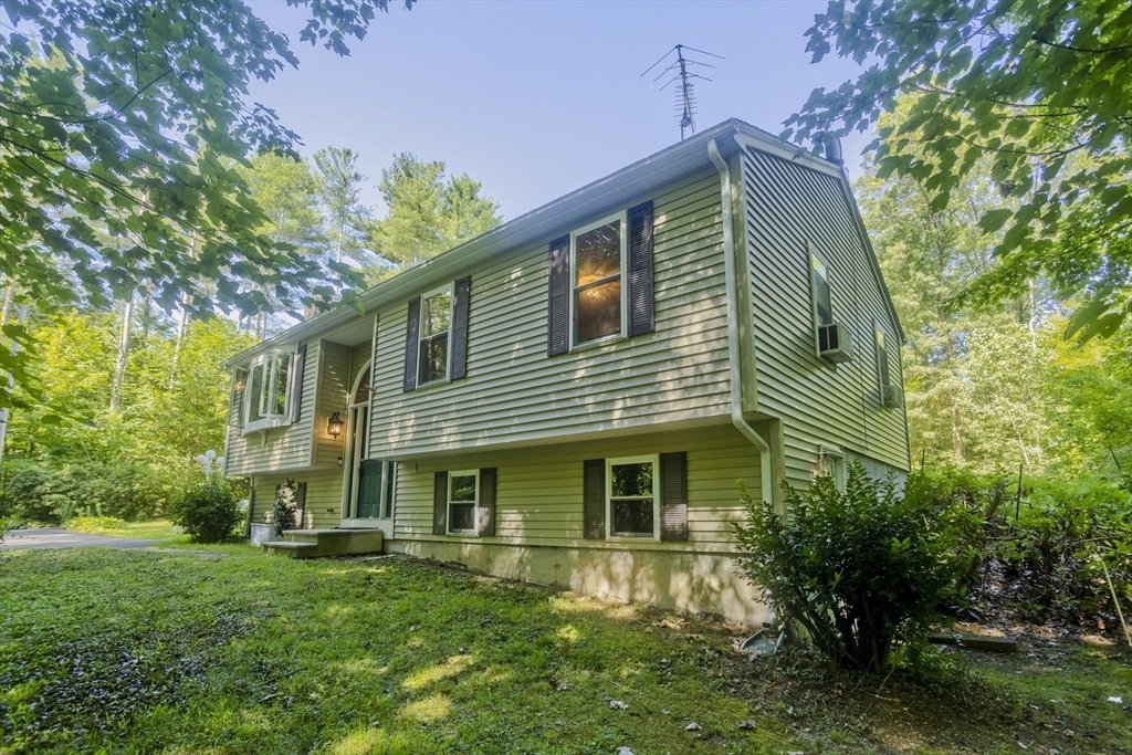 288 Fisk Road Hardwick, MA 01082 - Photo 2 of 42 a front view of a house with a yard