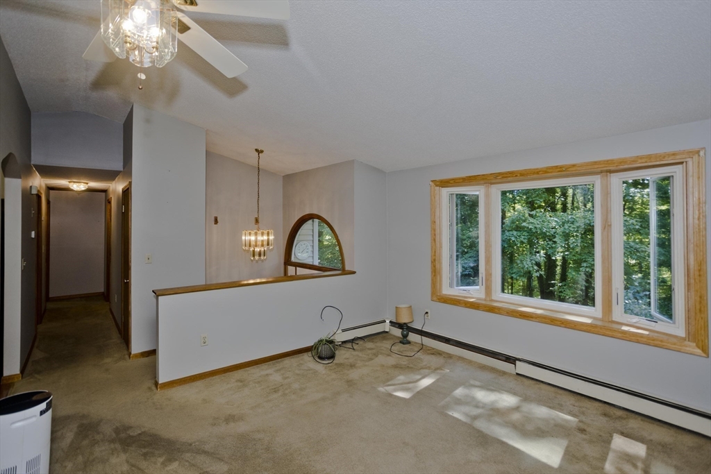 288 Fisk Road Hardwick, MA 01082 - Photo 27 of 42 a view of a livingroom with a ceiling fan and window