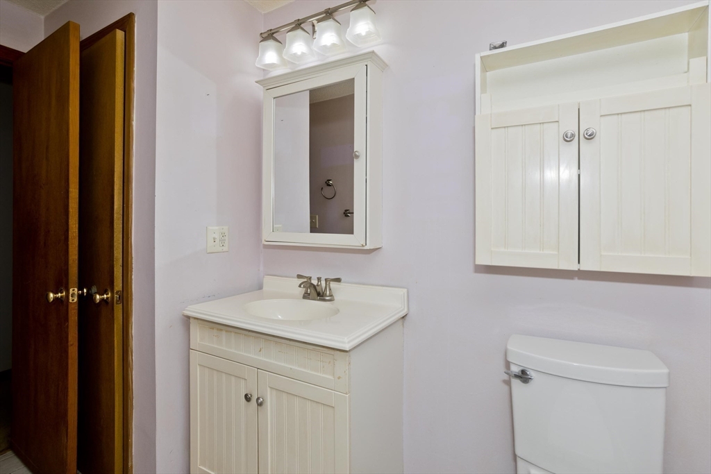 288 Fisk Road Hardwick, MA 01082 - Photo 29 of 42 a bathroom with a sink and a mirror