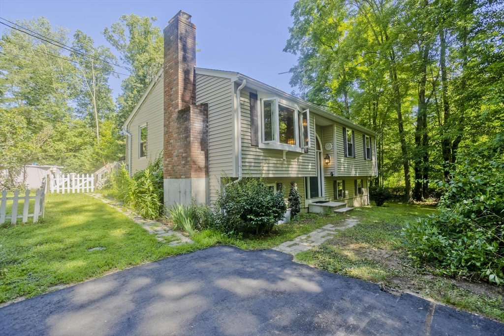 288 Fisk Road Hardwick, MA 01082 - Photo 3 of 42 a front view of a house with garden