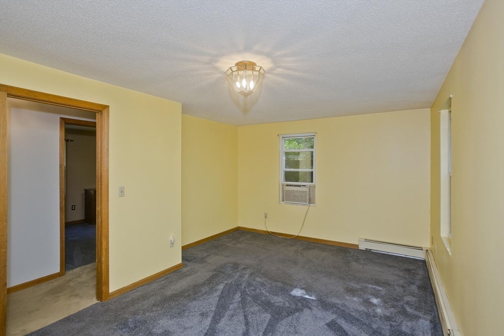 288 Fisk Road Hardwick, MA 01082 - Photo 31 of 42 a view of empty room with wooden floor