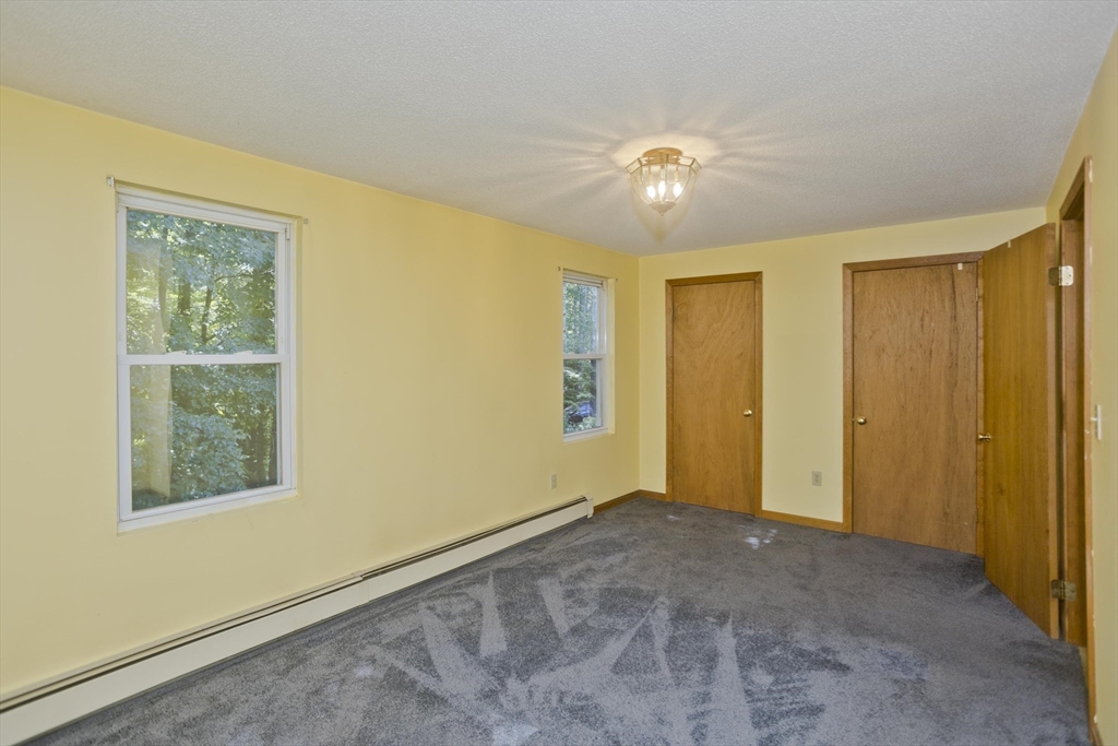 288 Fisk Road Hardwick, MA 01082 - Photo 33 of 42 a view of an empty room with a window