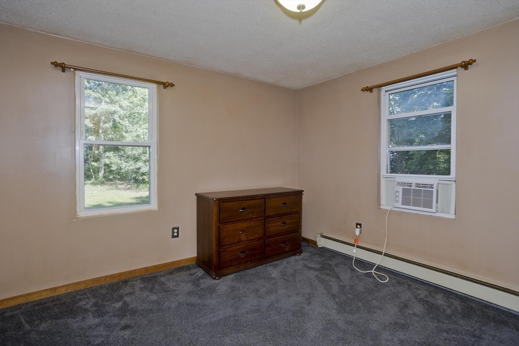 288 Fisk Road Hardwick, MA 01082 - Photo 35 of 42 an empty room with windows