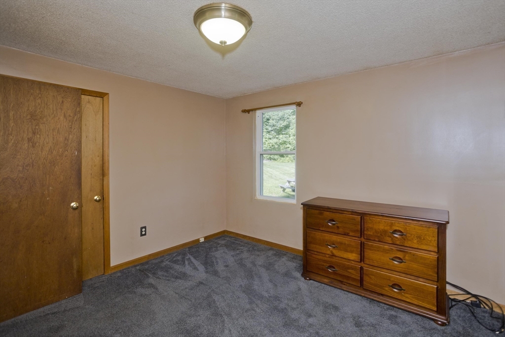 288 Fisk Road Hardwick, MA 01082 - Photo 37 of 42 an empty room with windows