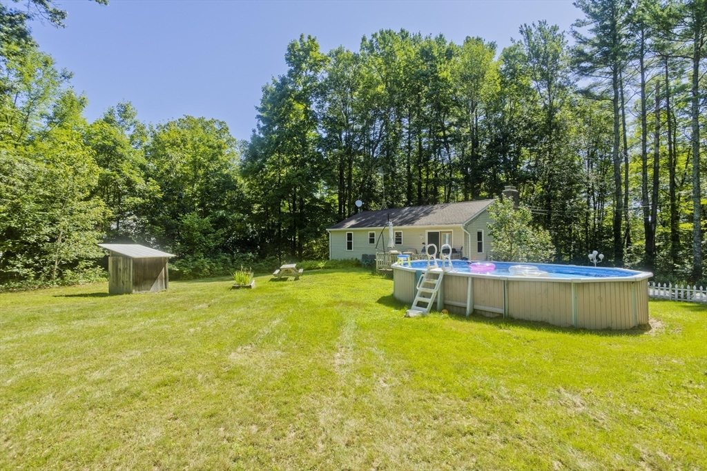 288 Fisk Road Hardwick, MA 01082 - Photo 7 of 42 a view of an house with swimming pool