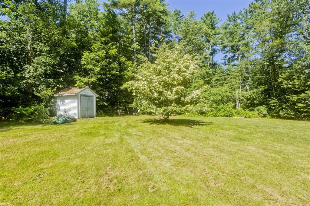 288 Fisk Road Hardwick, MA 01082 - Photo 9 of 42 a view of a house with a yard