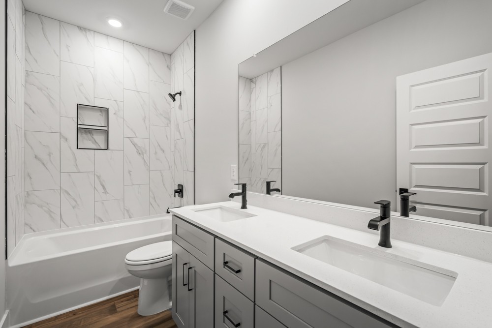 404 Springbrook Boulevard White House, TN 37188 - Photo 20 of 31 a bathroom with a sink a toilet and shower
