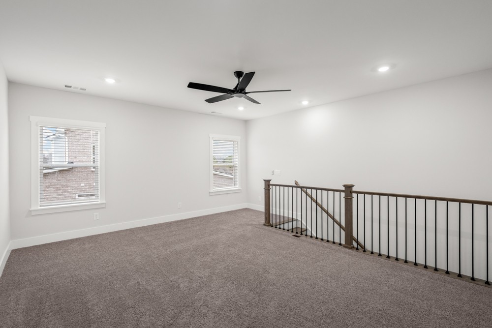 404 Springbrook Boulevard White House, TN 37188 - Photo 22 of 31 a view of a livingroom with a ceiling fan and window