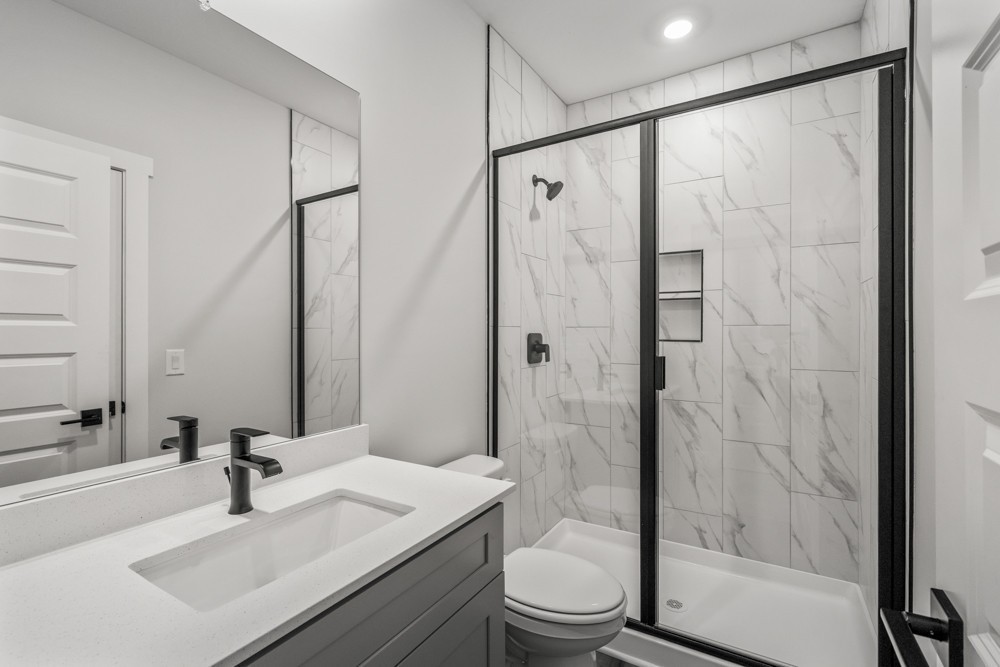 404 Springbrook Boulevard White House, TN 37188 - Photo 25 of 31 a bathroom with a sink toilet and shower
