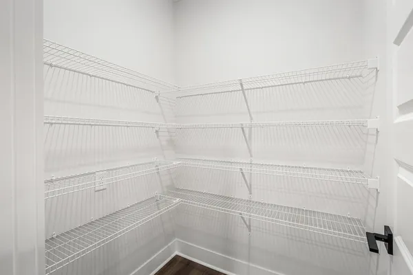 a view of a room with racks on the wall