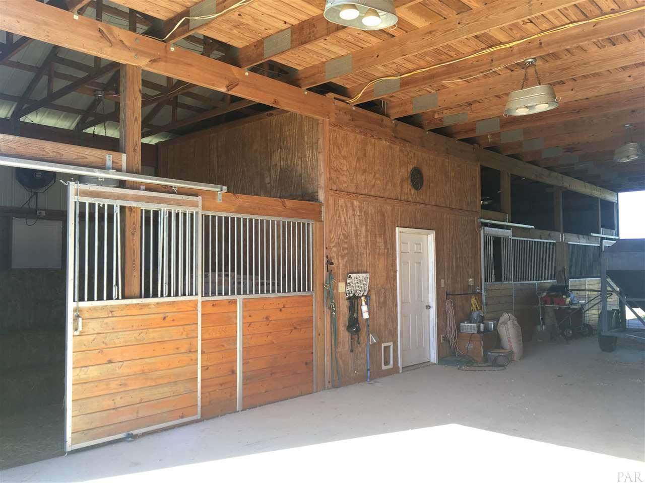 4792 Schaag Road, Unit INCLUDES 4840 Molino, FL 32577 - Photo 18 of 44 Concrete Alley, 6 large stalls, 160mph impact door