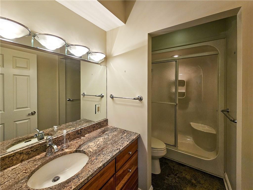 1845 Ferguson Road Allison Park, PA 15101 - Photo 22 of 50 a bathroom with a granite countertop sink toilet and shower