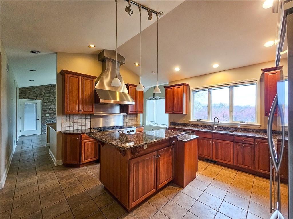 1845 Ferguson Road Allison Park, PA 15101 - Photo 25 of 50 a kitchen with stainless steel appliances granite countertop a stove a sink dishwasher and a refrigerator