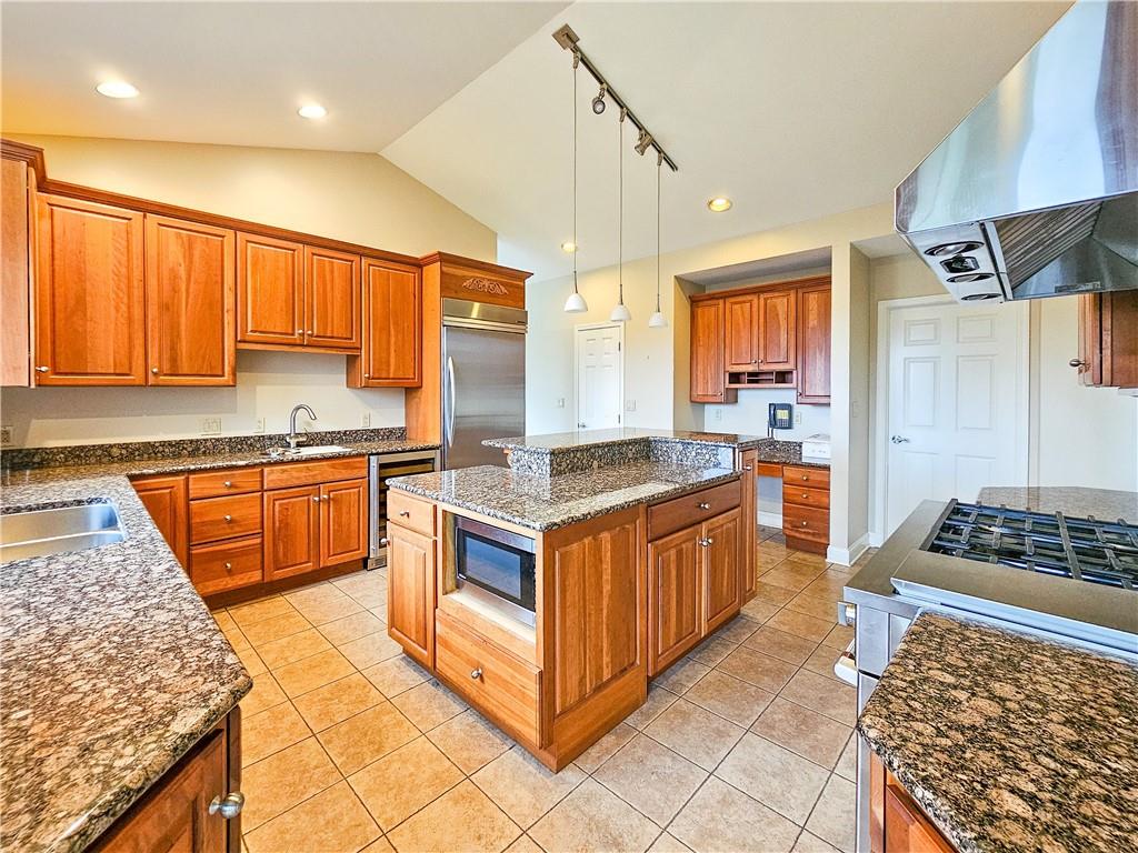 1845 Ferguson Road Allison Park, PA 15101 - Photo 27 of 50 a kitchen with stainless steel appliances granite countertop a stove a sink and a refrigerator
