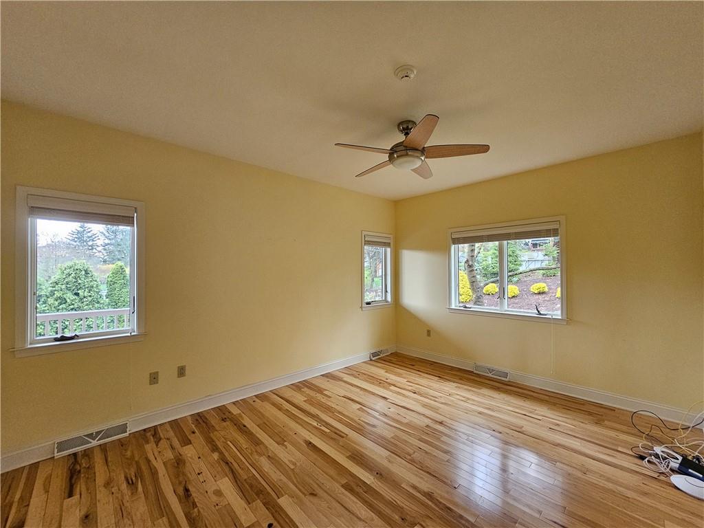 1845 Ferguson Road Allison Park, PA 15101 - Photo 34 of 50 a view of empty room with wooden floor and fan