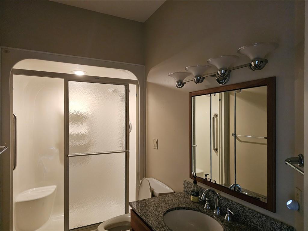 1845 Ferguson Road Allison Park, PA 15101 - Photo 36 of 50 a bathroom with a granite countertop sink mirror vanity and toilet