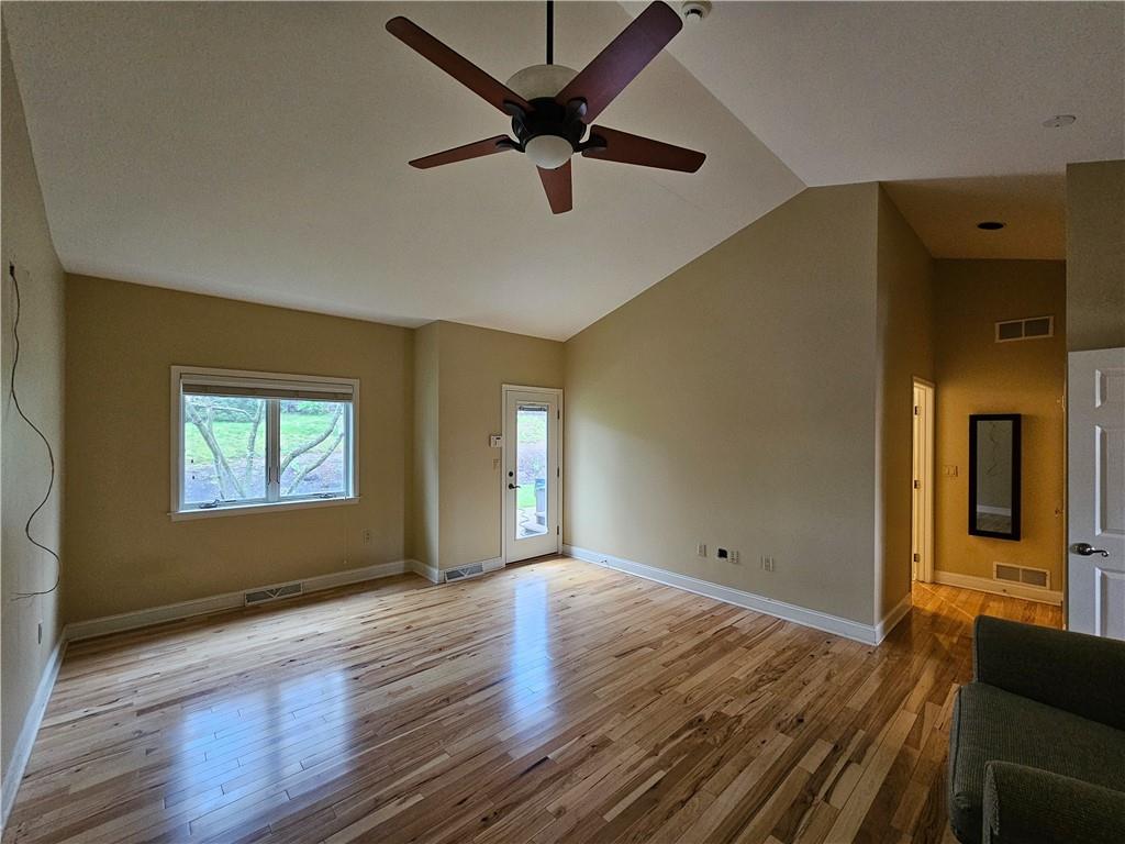1845 Ferguson Road Allison Park, PA 15101 - Photo 37 of 50 a view of an empty room with window and wooden floor