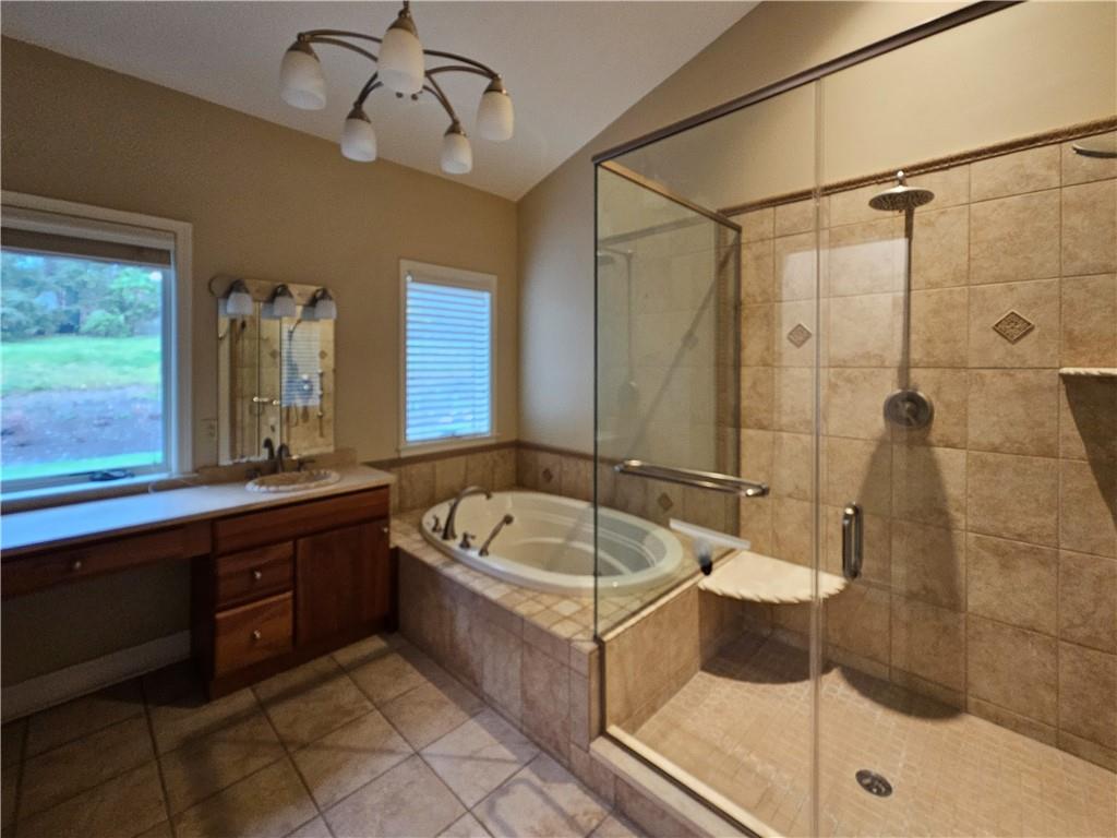 1845 Ferguson Road Allison Park, PA 15101 - Photo 38 of 50 a spacious bathroom with a tub sink and mirror