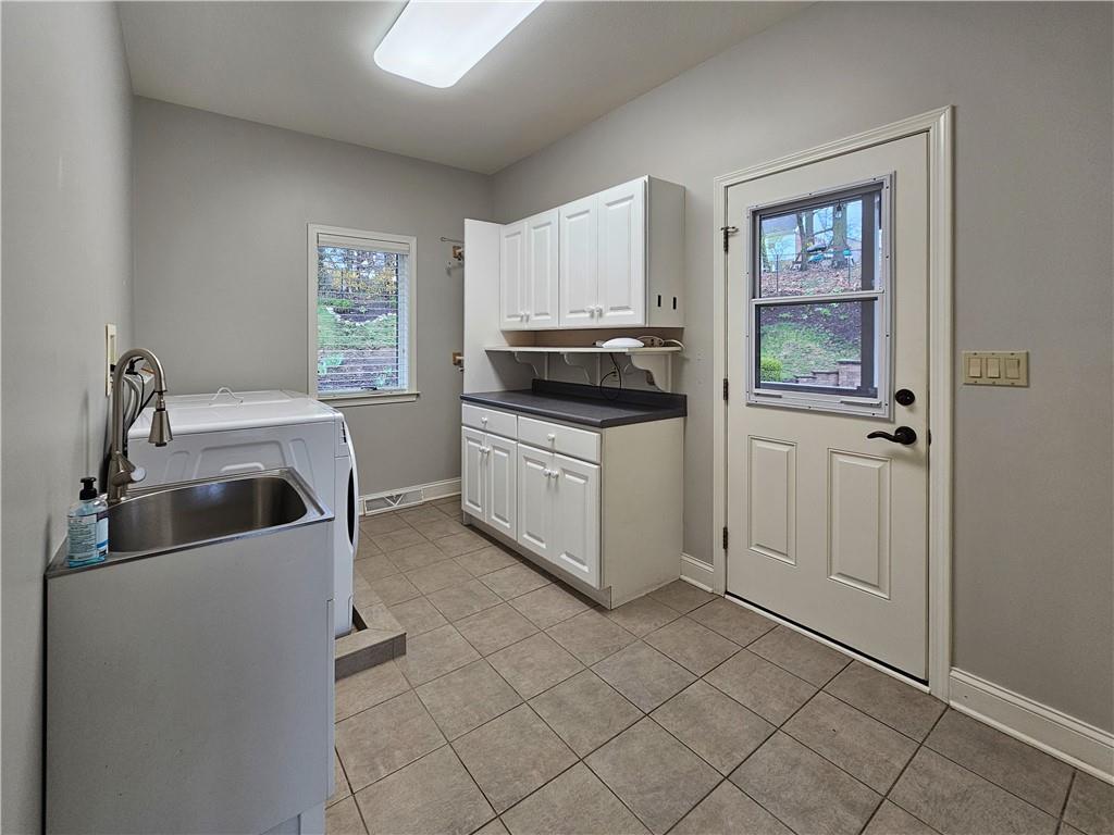 1845 Ferguson Road Allison Park, PA 15101 - Photo 43 of 50 a kitchen with white cabinets and white appliances