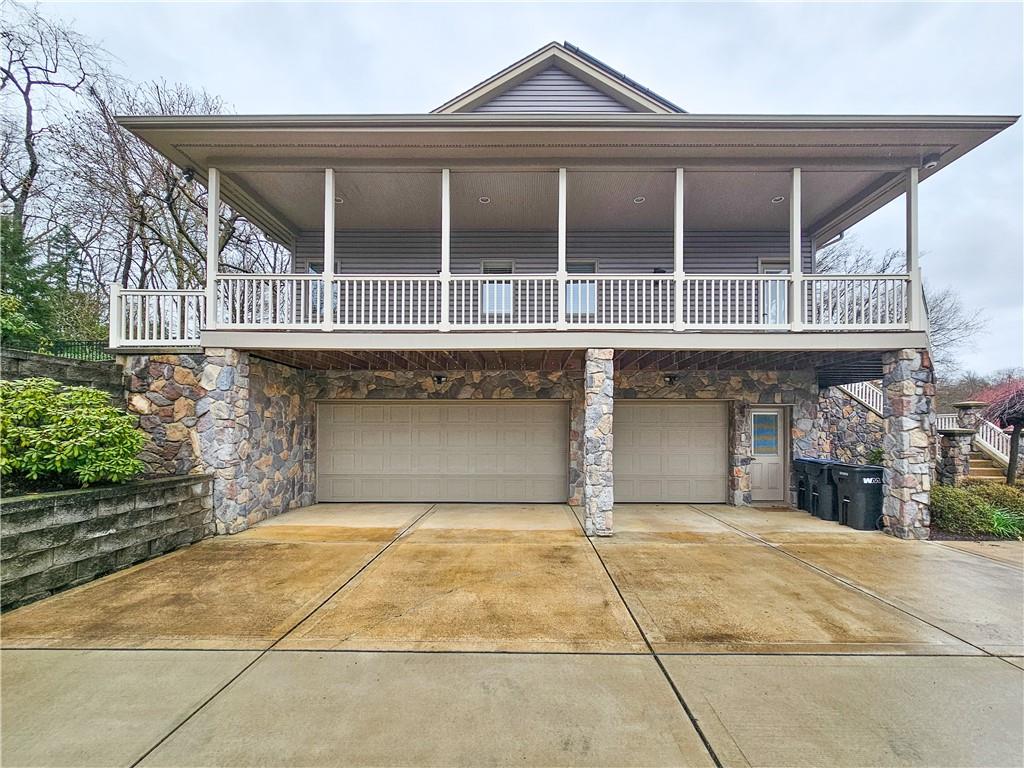 1845 Ferguson Road Allison Park, PA 15101 - Photo 6 of 50 a front view of a house with a garden