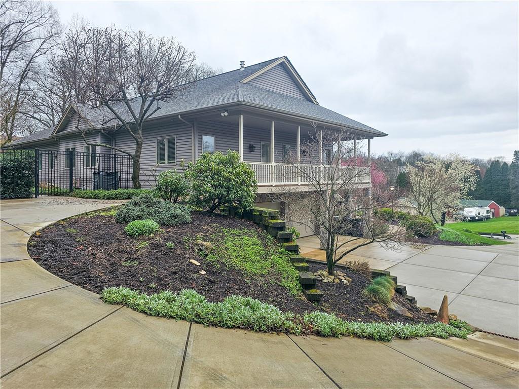 1845 Ferguson Road Allison Park, PA 15101 - Photo 7 of 50 a front view of a house with a garden