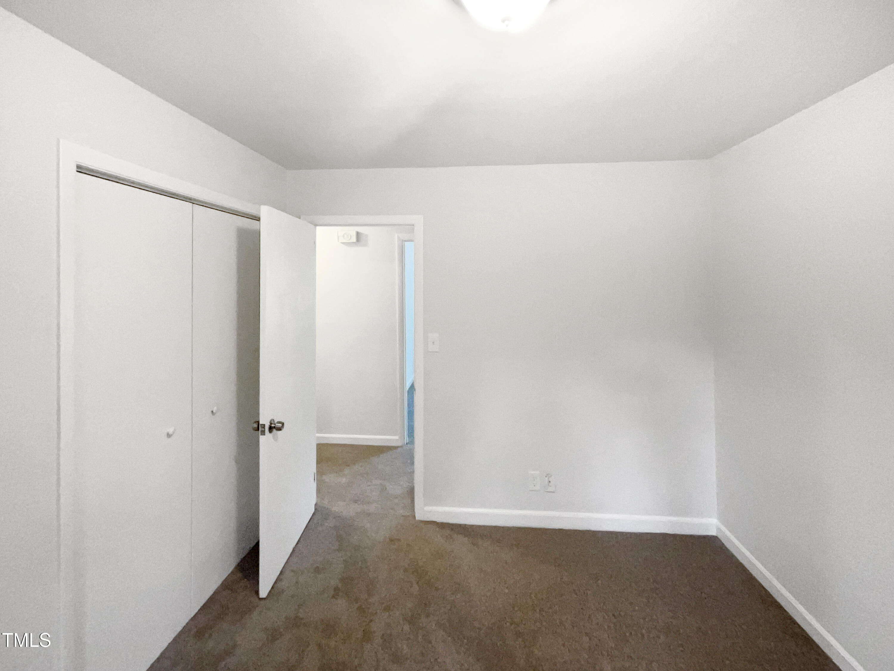 623 Sybil Drive Durham, NC 27703 - Photo 17 of 18 a view of an empty room